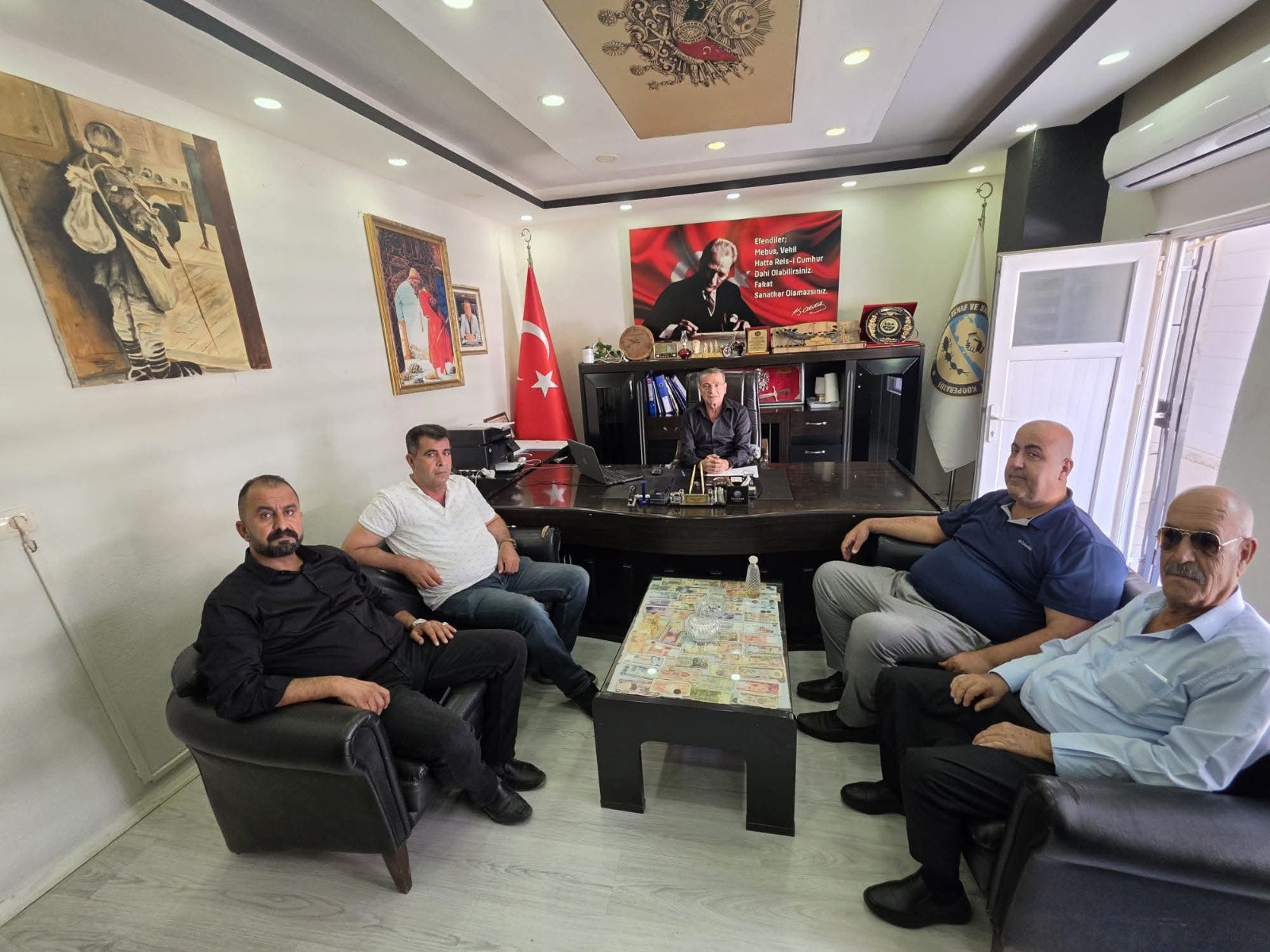 Kahta Milliyetçisi Hareket Partisi İlçe Başkanı Turan'dan Esnaf Kooperatif Başkanı Çatan'a Ziyaret